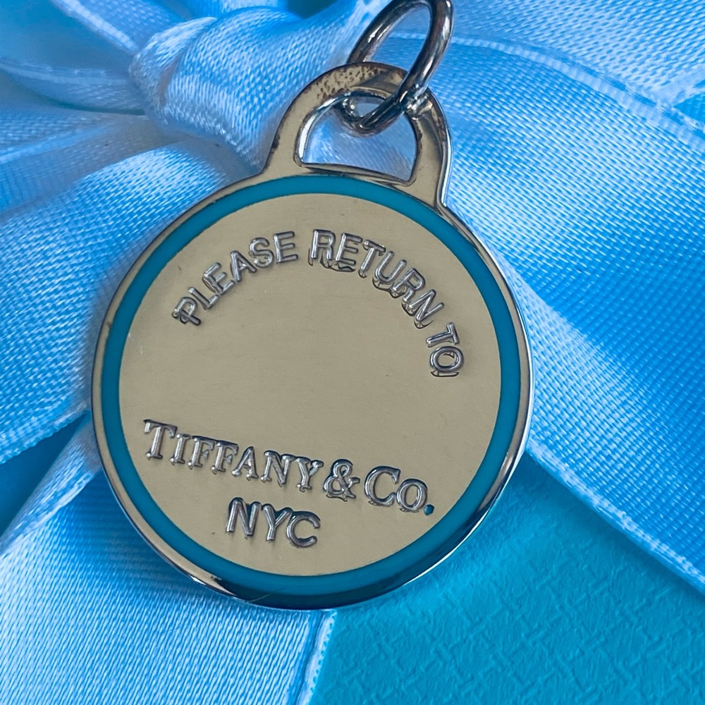 Tiffany & Co. New, Authentic Sterling Silver Round Tag Charm “Return to Tiffany”